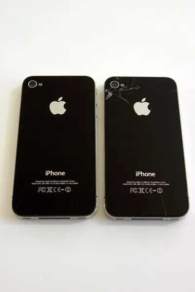 Пара телефонов Apple Iphone 4 — стоковое фото