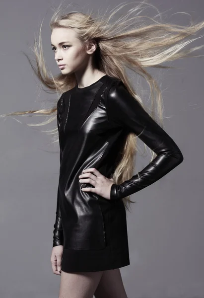 Portrait of a young woman with long hair — Stock Photo, Image