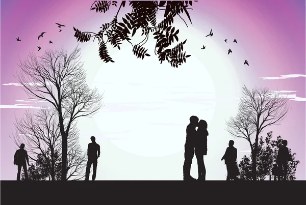 Mann und Frau küssen sich im Park — Stockfoto