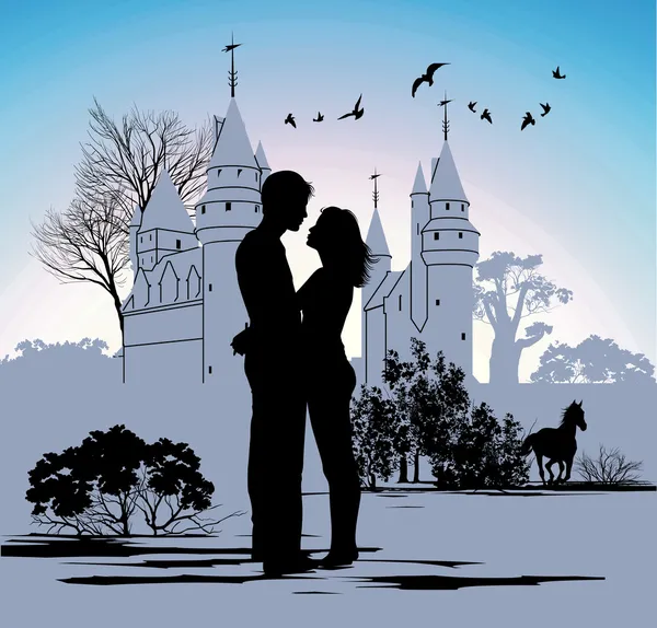 城を背景に、お互いを見て若いカップル — ストック写真