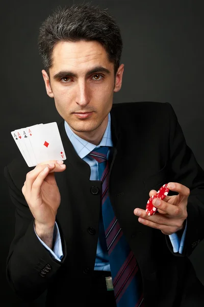 Gambler with cards and chips. — Stock Photo, Image