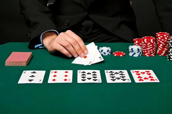 Gambler with cards and chips. — Stock Photo, Image