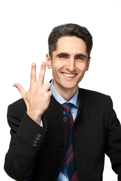 Νέος επιχειρηματίας δείχνει σημάδια χέρι. — Φωτογραφία Αρχείου