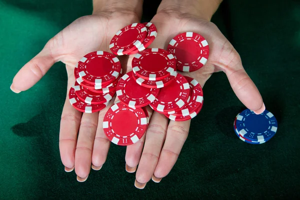 Gambler with chips in hand. — Stock Photo, Image
