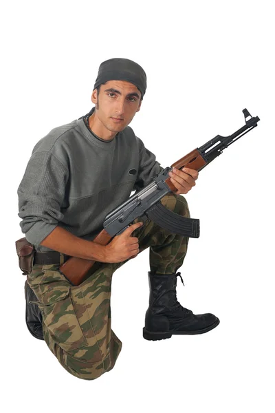 stock image Man in camouflage with gun.