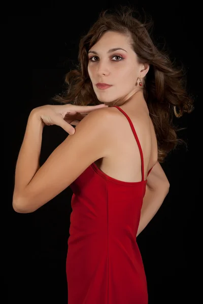 Сексуальная девушка в красном платье . — стоковое фото