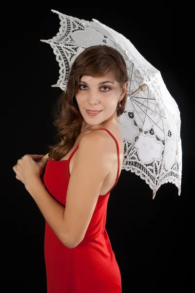 Sexy jonge vrouw in rode jurk. — Stockfoto