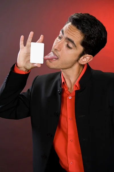 Businessman with plastic card. Humor. — Stock Photo, Image