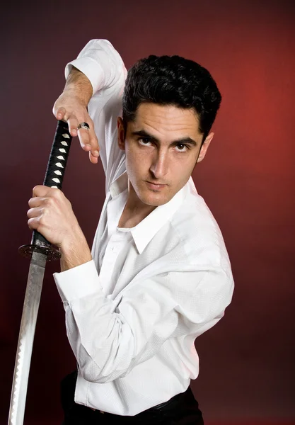 stock image Handsome man with sword.