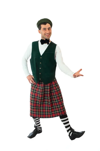 Экспрессивный человек в шотландском костюме . — стоковое фото