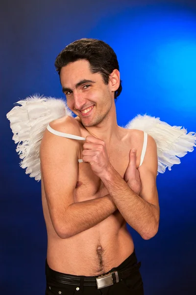 Glamour muž s bílými křídly. — Stock fotografie