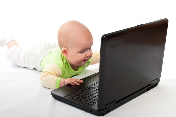 Little baby with laptop. — Stock Photo, Image
