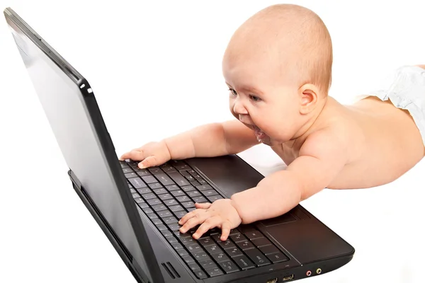 Little baby with laptop. — Stock Photo, Image