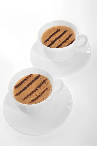 Cup of coffee with chocolate lines. — Stock Photo, Image