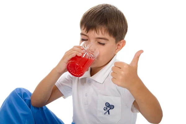 Niño con vaso de jugo — Foto de Stock