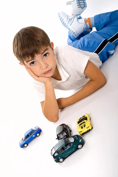 Chlapec s hračkami. — Stock fotografie