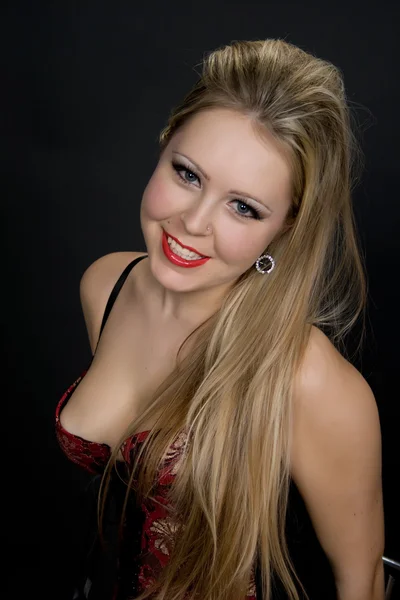 Sexy jonge vrouw in korset. — Stockfoto