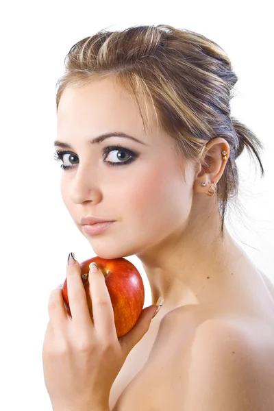 Schönes Mädchen mit rotem Apfel. Stockbild