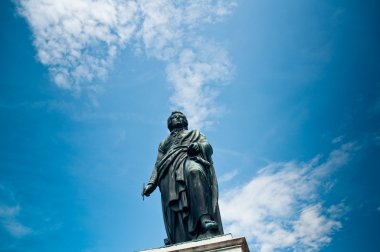 Statue of famous composer W.A.Mozart in Salzburg, Austria clipart