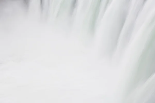 Водопад абстрактный фон, размытие движения — стоковое фото
