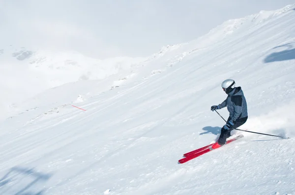 Skier traveling over snow — Stock Photo, Image