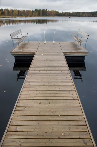 stock image Wooden pier with boat