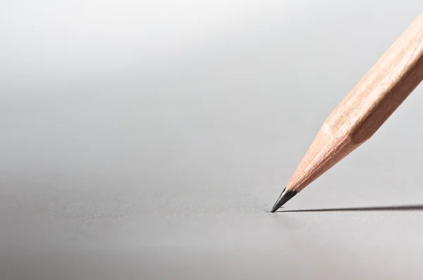 Олівець на папері, крупним планом Стокове Фото