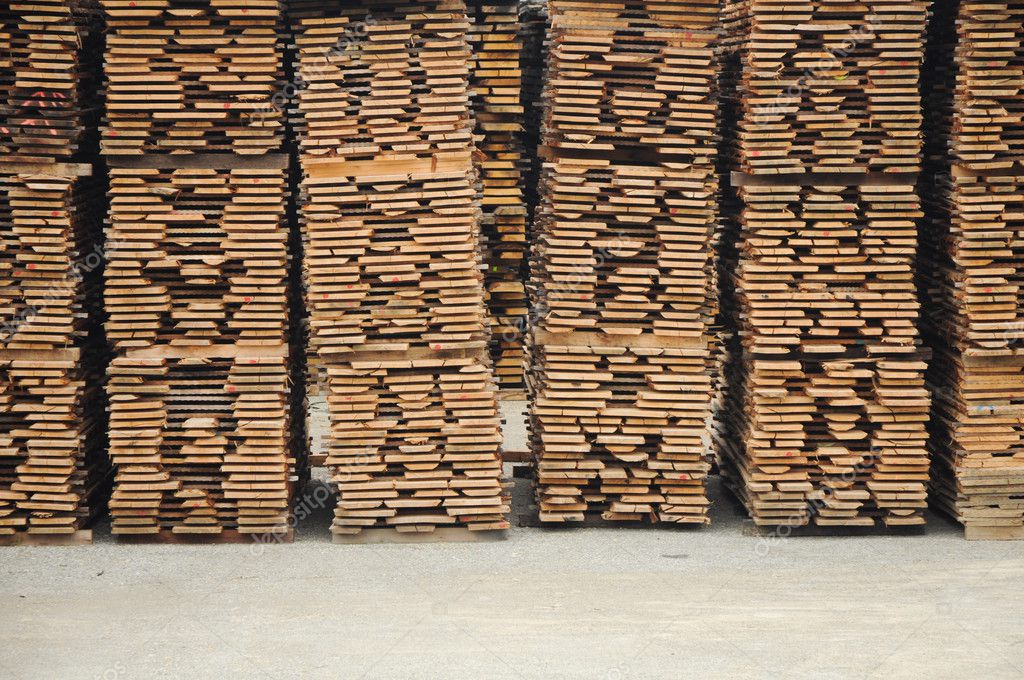 Wood planks stored outside for further processing or expedition — Stock