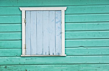 Aged colored wood wall with door clipart