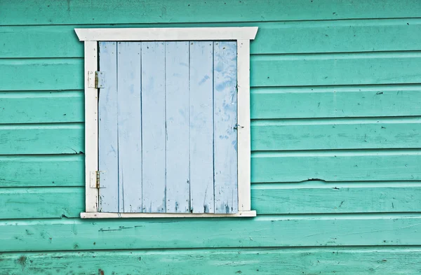 stock image Aged colored wood wall with door