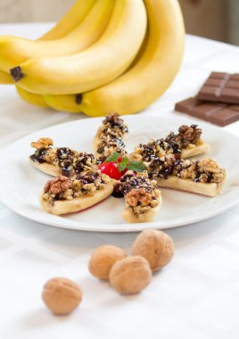 Desert with bananas and walnuts clipart