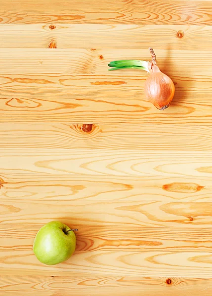 Яблоко и лук — стоковое фото