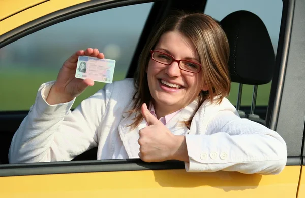 stock image Young girl with driver licence