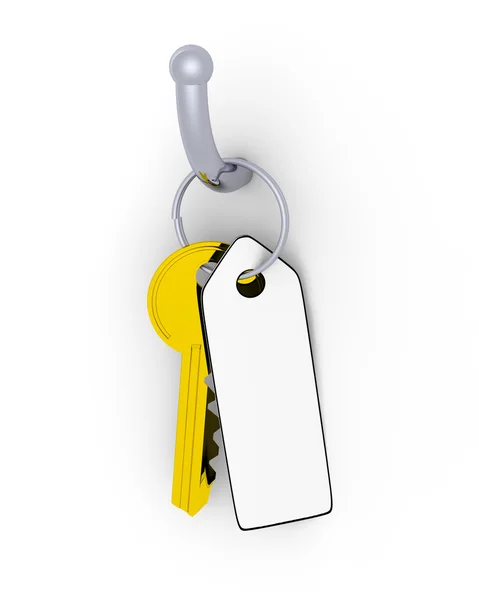 Goldener Schlüssel mit Anhänger — Stockfoto