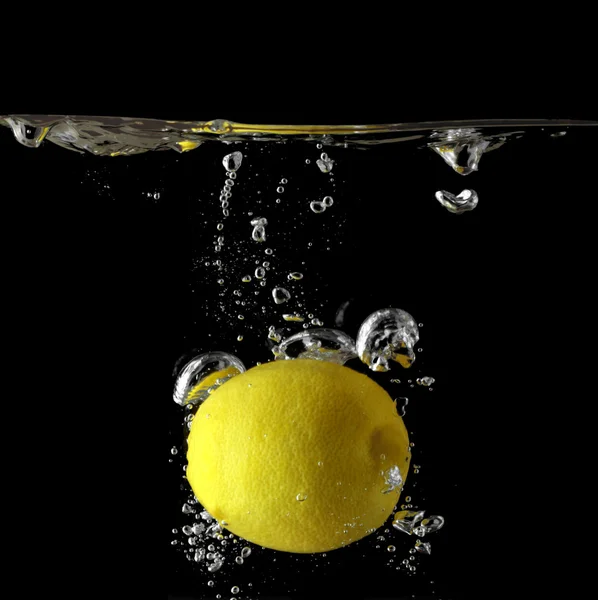 stock image Lemon in water.