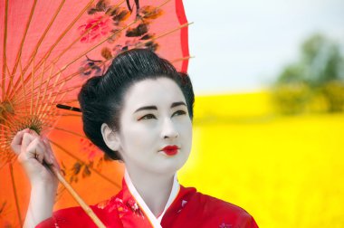 Geisha in the yellow field clipart