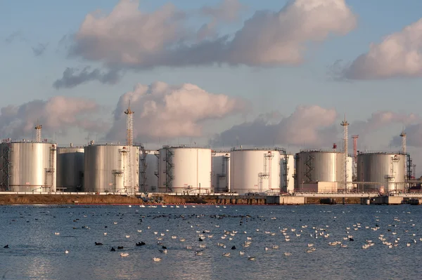 stock image Silver tanks at the sunset