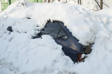 Winter in Moscow. The car in the snow clipart