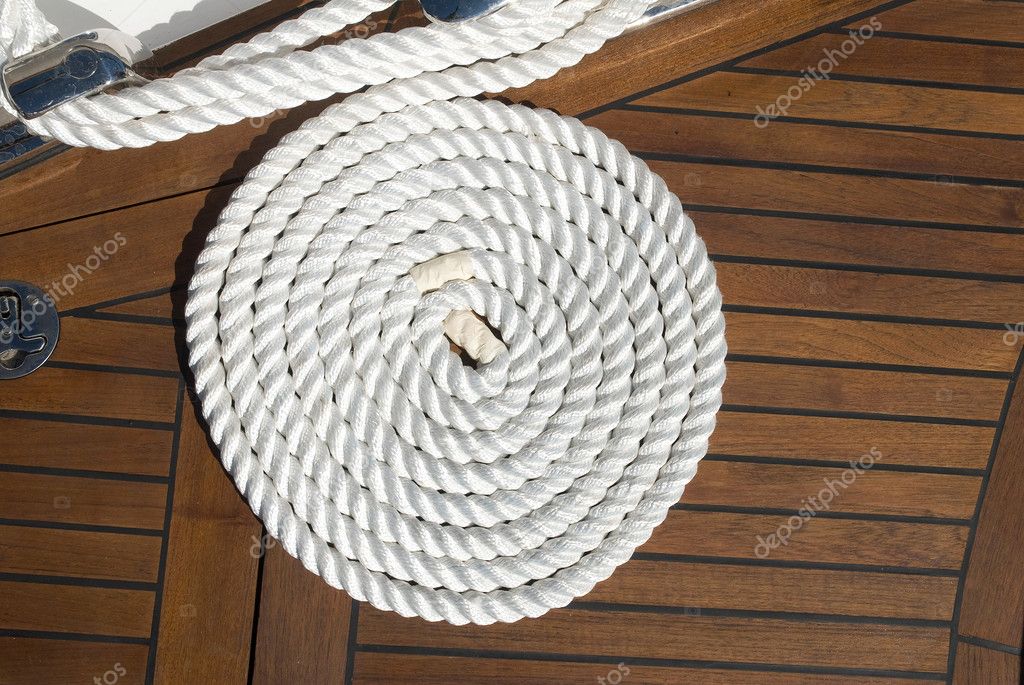 Coiled line of boat rope on deck