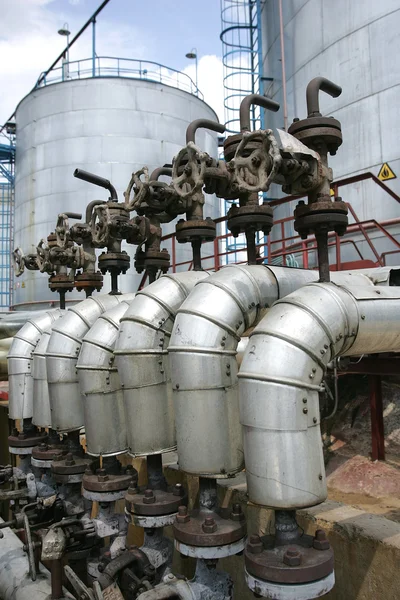 Russia. Oil and gas production. Oil tank and valve — Stock Photo, Image