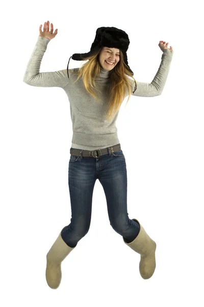 Skoków dziewczyna w futro kapelusz — Zdjęcie stockowe