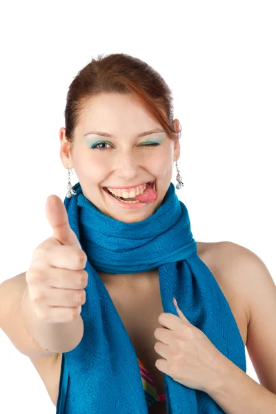 快乐的年轻女人在蓝色围巾 免版税图库图片