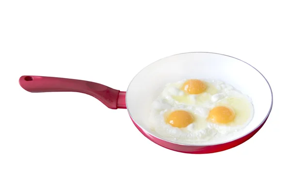 Fried eggs in a frying pan — Stock Photo, Image