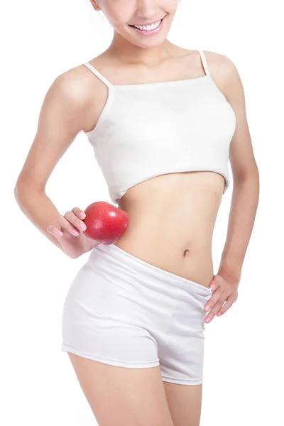 年轻性感的女人的身体和红苹果 — 图库照片