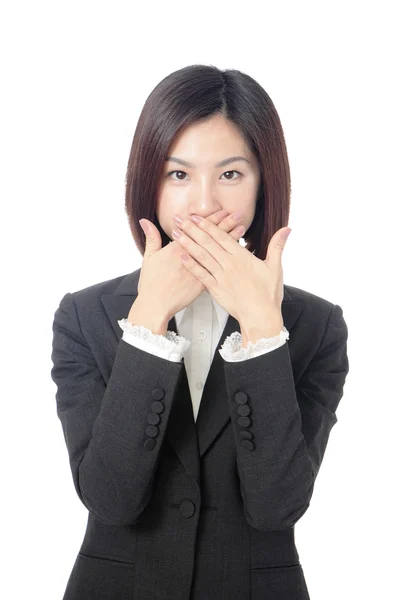 Biznes kobieta obejmujące z rąk jej usta — Zdjęcie stockowe