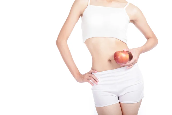 Сексуальное женское тело и красное яблоко — стоковое фото