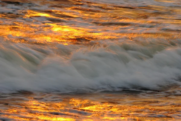 Golden sea with wave — Stock Photo, Image