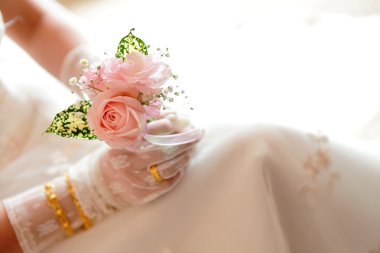 Romantic Rose in bride's hand clipart