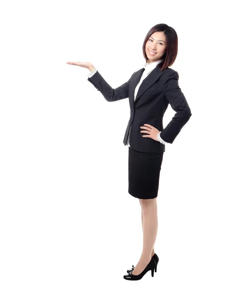 Full length Business woman introducing something by hand — Stock Photo, Image