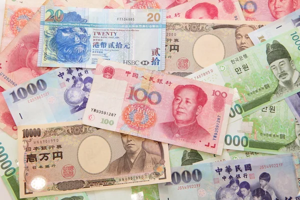 Tło azjatycki waluty — Zdjęcie stockowe